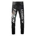 AMIRI Patchwork Slim Jeans – Full Logo Distressed Denim